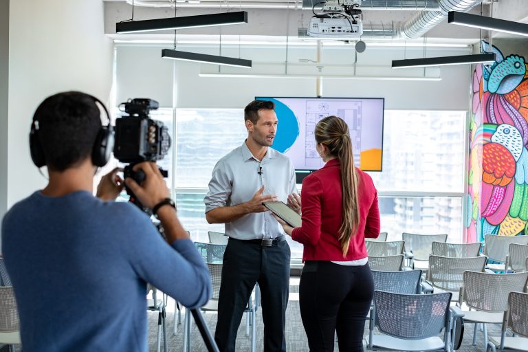 Business Man In Office Talking And Smiling During Corporate Interview